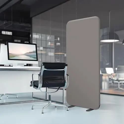 Grey acoustic desk partition in modern coworking space