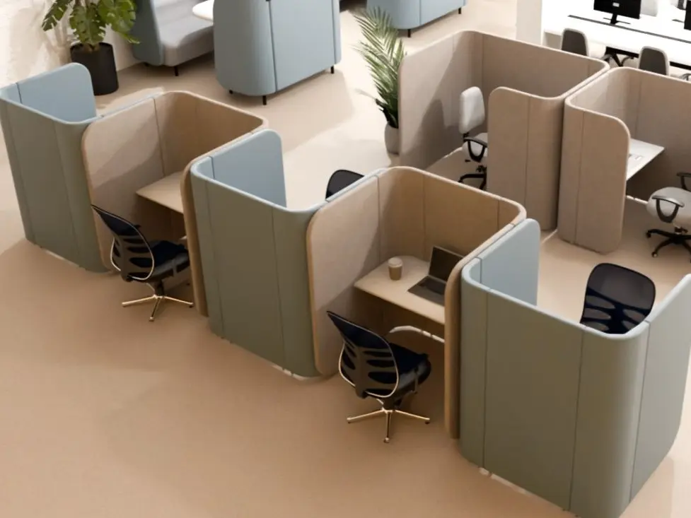 Brown fabric acoustic dividers at wall-mounted work desk