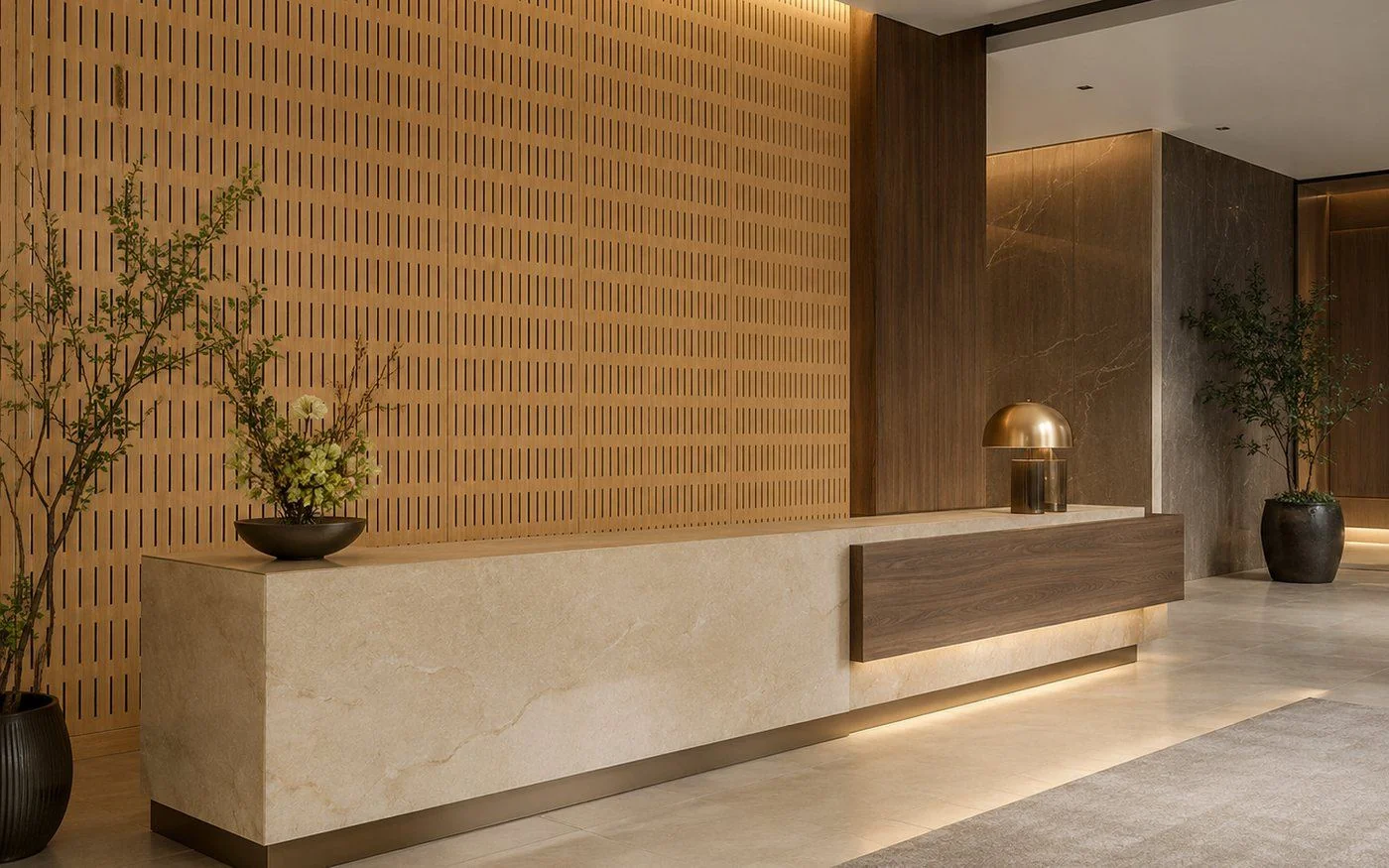 Slotted wood acoustic panels installed in a hotel lobby / reception — Yamamah Smart