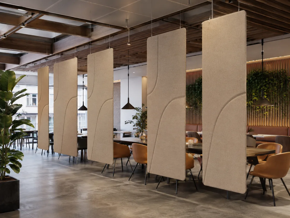 Suspended hanging acoustic dividers in a modern restaurant — beige fabric, ceiling-mounted
