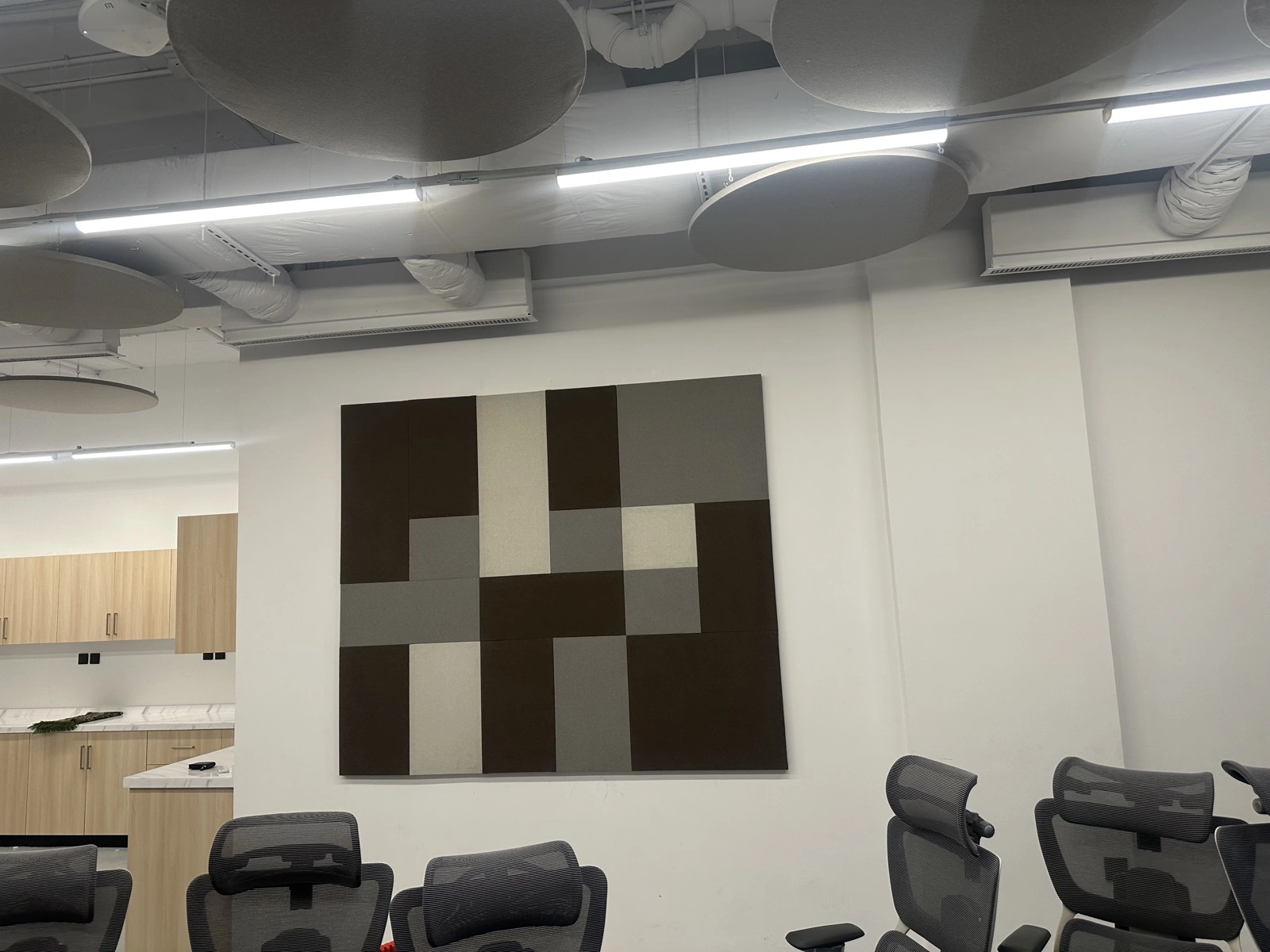 HungerStation HQ — fabric acoustic wall panels close-up