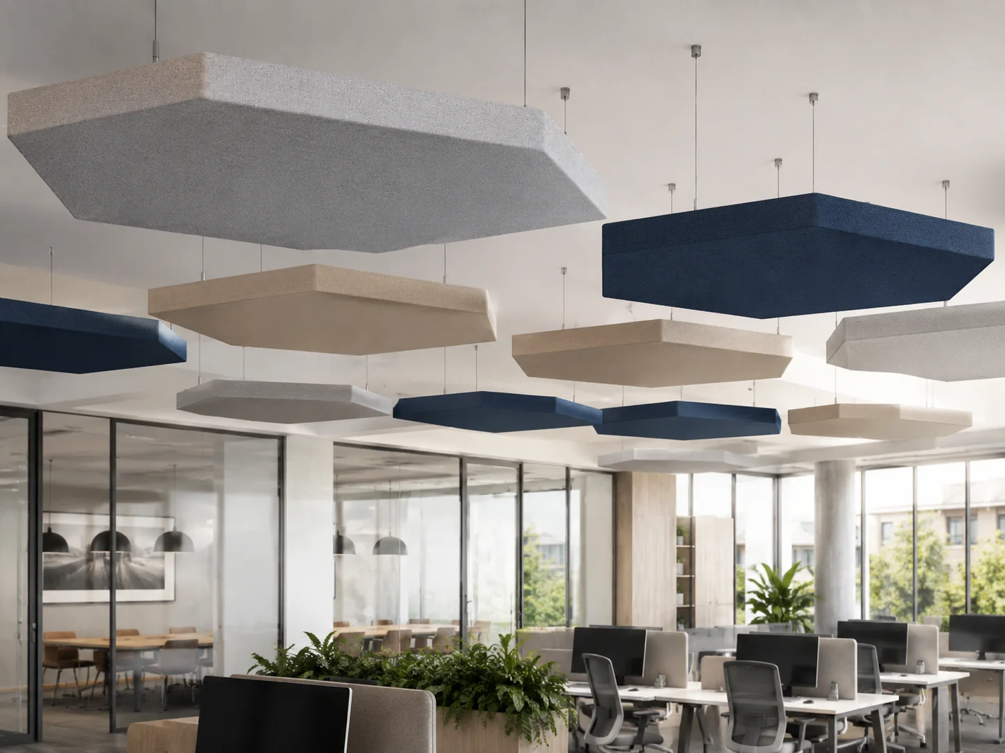Hexagon fabric baffles above executive boardroom — grey, navy, and beige tessellated cluster with mirrored wall